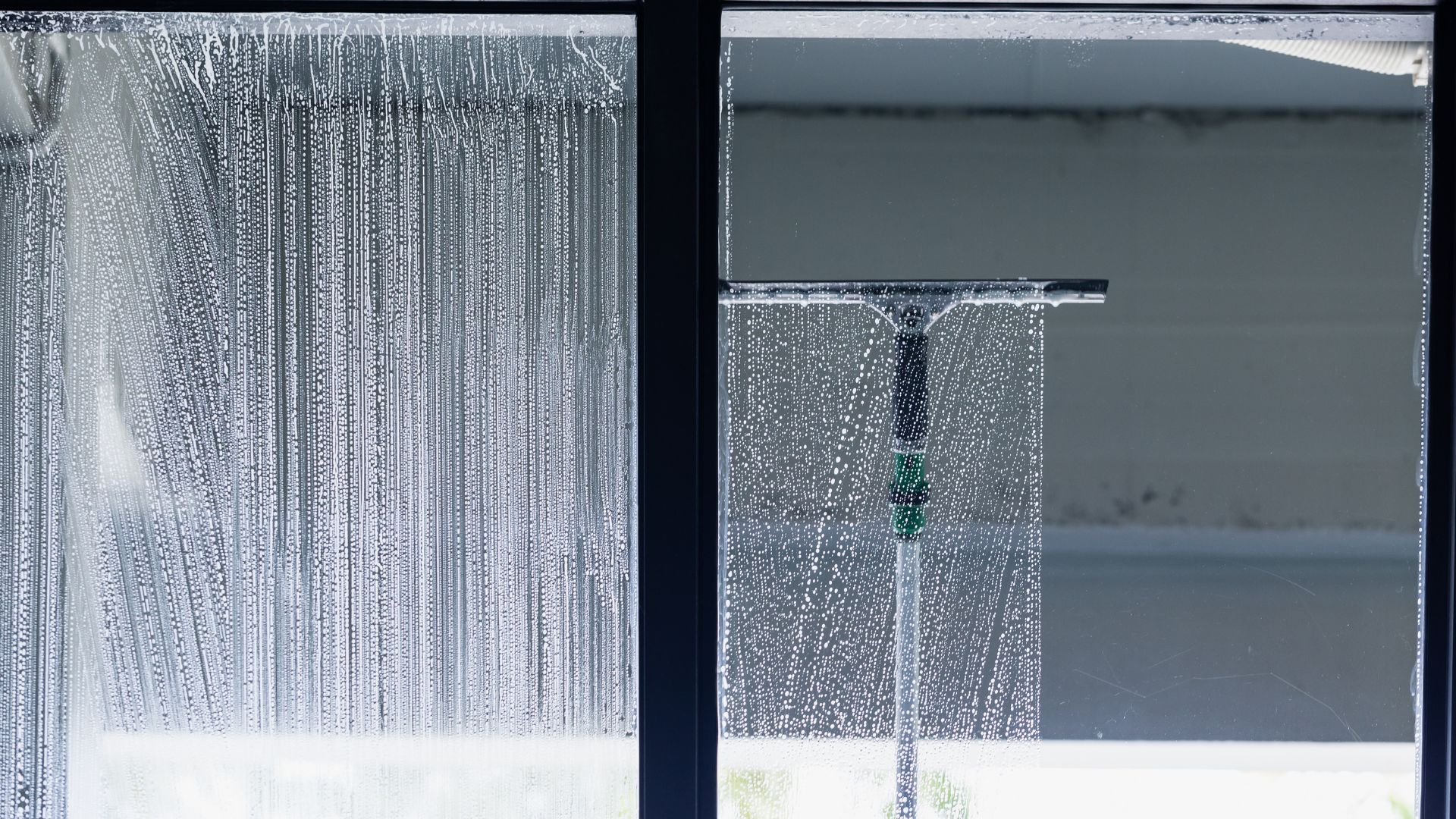 A window with water running down the side of it